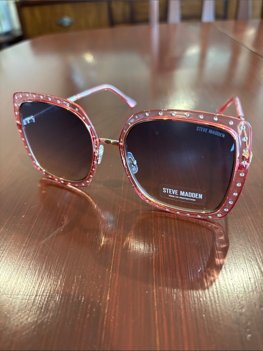 Steve Madden 100% UV protection,pink tortoise shell w/rhinestones, gold arms
